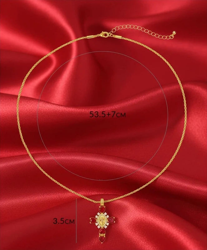 Crucifixo em ouro 18k e pedras zircônia vermelhas