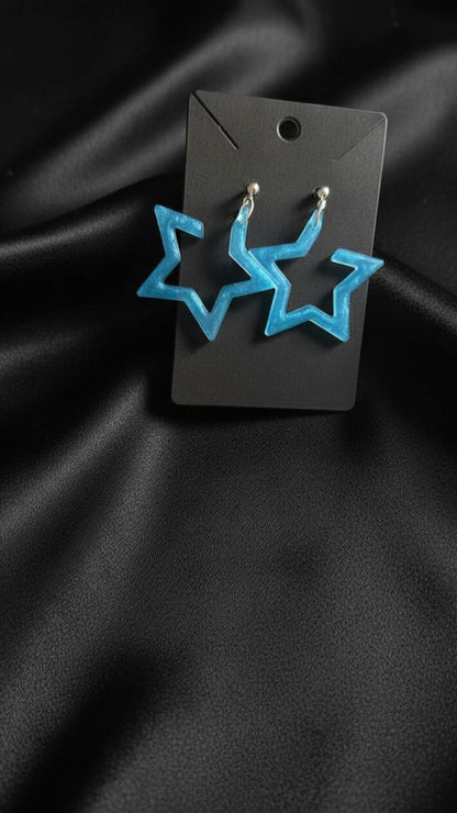 Brinco estrela azul